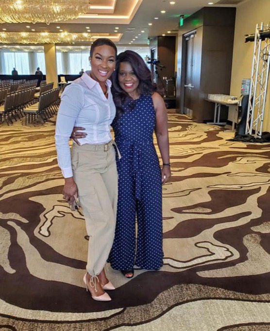 Coach Ann with a member at an event
